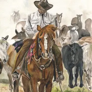 Cowboy riding horse in cattle drive