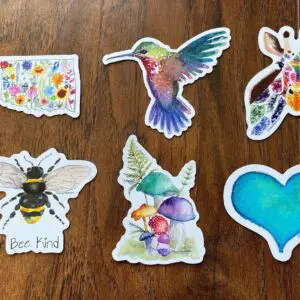 Colorful stickers on wooden surface