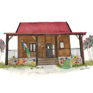 Cabin surrounded by colorful flowers