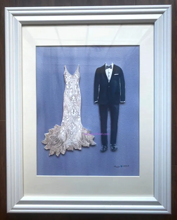 Wedding dress and tuxedo in frame
