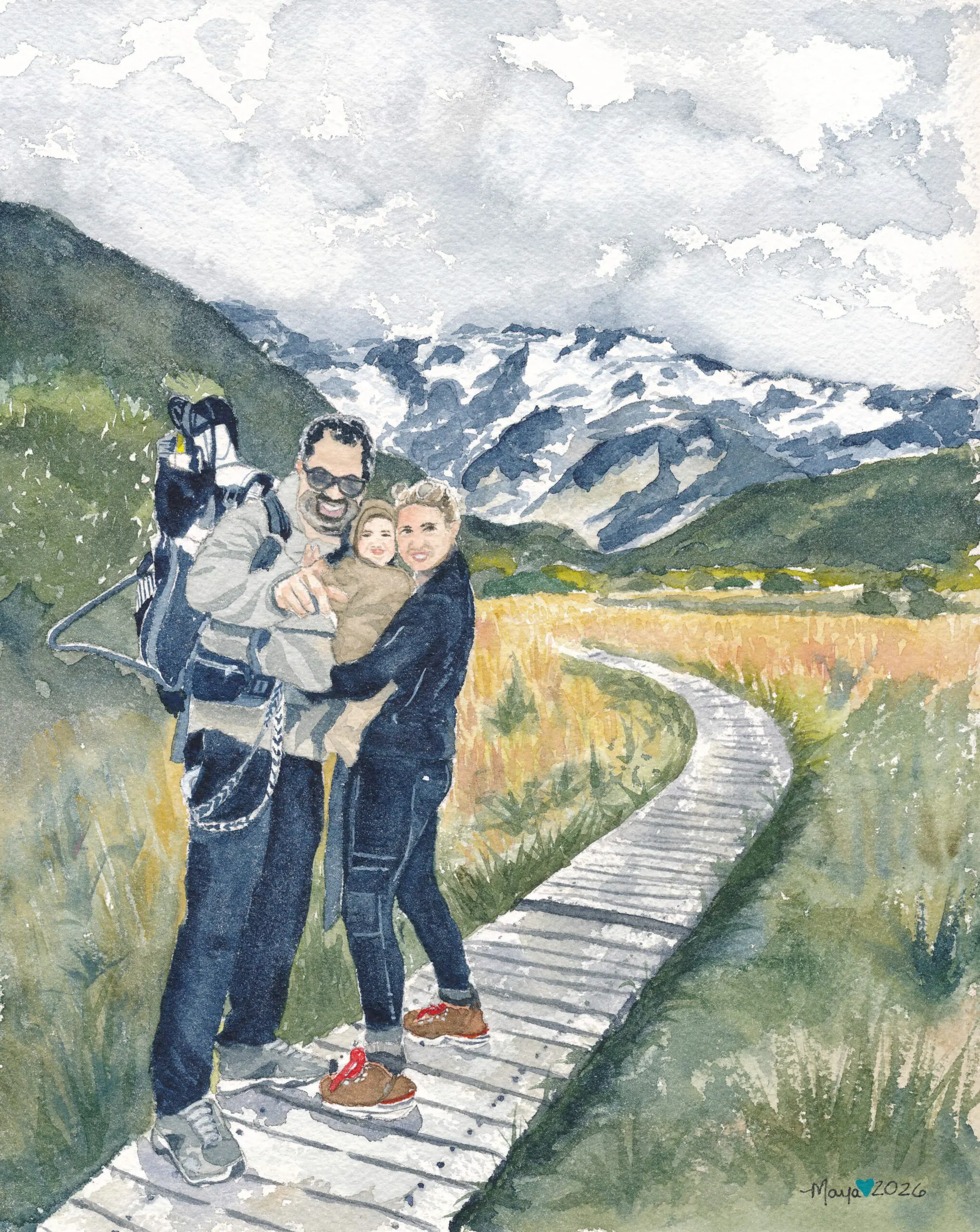 Family hiking on boardwalk toward snowy mountains