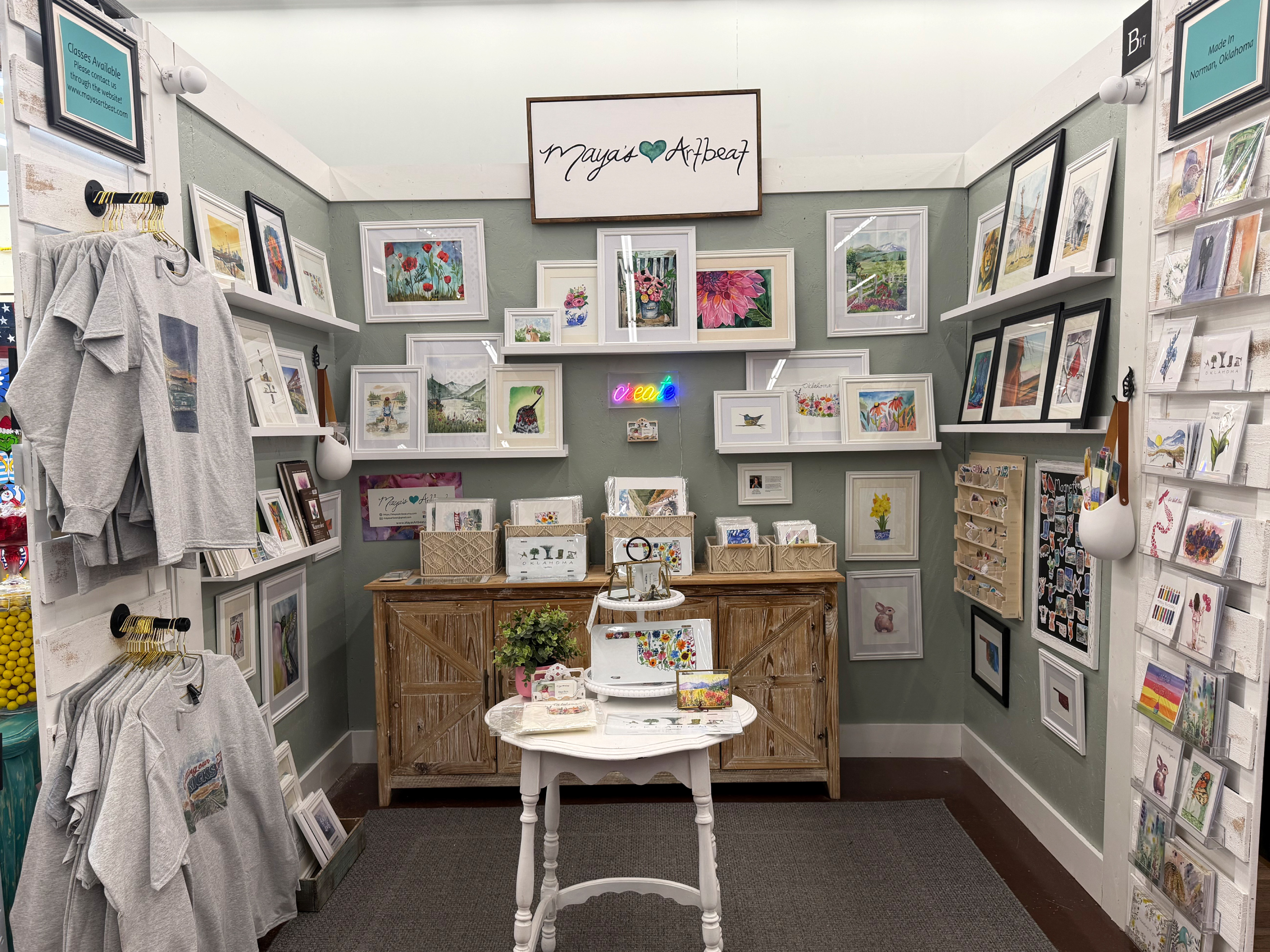 Gallery wall of framed art prints and cards