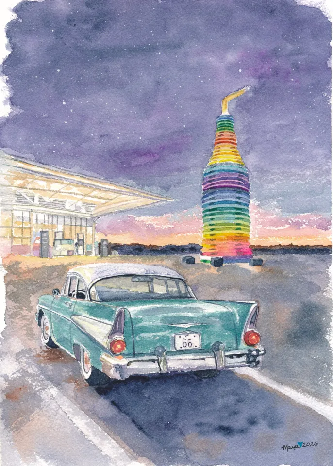 Teal vintage car near colorful spiral tower