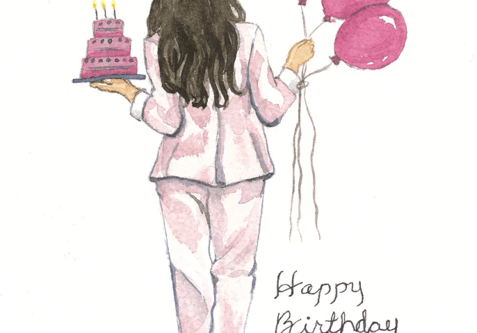 Woman in pink suit holding cake and balloons